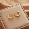 Acero de Titanio Color Libre Metal Pendientes Personalizados Europeos y Americanos Calle Casual Accesorios para la Cabeza Pendientes de Anillo Transfronterizos Puesto