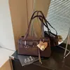 Bolso de axila versátil de moda transfronterizo para mujer, bolso de mano de alta gama, nuevo bolso simple estilo coreano 2026 para el día a día