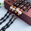 Venta al por mayor del fabricante Cordón Tejido Grueso Imitación Obsidiana Negra Joyería Dorada Jade Colgante de Jade Cordón Colgante Cordón para el Cuello