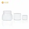 Mancha 150g botella de vidrio blanco gran capacidad porcelana blanca crema embotellada 100g tapa curva tarro de crema material de embalaje