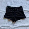 Roupas femininas estilo esportivo americano 2026 com estampa de padrão de comércio exterior, cores contrastantes, cintura baixa, modelagem que emagrece, shorts básicos versáteis ins