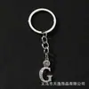 Llavero Creativo con Letra Inglesa Llavero de Venta Caliente Europea y Americana Regalo Conmemorativo Colgante de Letra Pequeños Accesorios