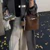 Bolso Cubo de Mano Versátil Retro de Gama Alta para Otoño e Invierno para Mujer 2025 Nueva Moda Bolso de Hombro Individual Cruzado