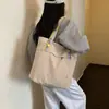 Bolsa tote casual de gran capacidad para mujer, nuevo bolso de hombro otoño 2026, bolsa de alta apariencia para estudiantes universitarios que van a clase