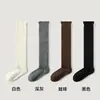 Calcetines de lana hasta la pantorrilla para mujer para otoño e invierno, tejido hueco con relieve de cachemira, adelgazantes, engrosados, cálidos, calcetines largos de tubo apilados