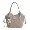 Bolso de mano de lujo nicho de alta gama para mujer, nuevo bolso de hombro popular de moda primavera-verano 2026, bolso tote cruzado