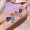 Libro Rojo Pequeño Video Corto Más Vendido Mismo Estilo Conjunto de Tres Piezas Moda Pendientes de Aro Colgantes Collar Forma de Lazo Joyería