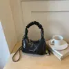 Bolso de mano tejido plisado de alta calidad para mujer, nueva colección de verano 2026, bolso cruzado con correa de cadena para el trabajo