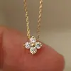 Colección transfronteriza de nuevos colgantes de la serie trébol de cuatro hojas de la suerte con circonita, diseño exquisito y elegante, cadena de clavícula clásica y versátil