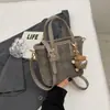 Bolso de Mano de Cubo Sólido de Moda para Mujer 2026 Nuevo Otoño Temprano Bolso de Hombro Vintage Bolso Cruzado Casual para Viajar Tendencia