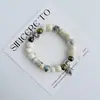 Pulsera de Cerámica Jingdezhen Nueva Historieta China Pulsera Boutique Venta al por Mayor Estudiante Joker Explosiones Puesto del Mercado Nocturno Pulsera