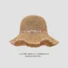 Sombrero de paja para mujer, novedad de verano 2025, sombrero de paja hueco para viajes, protección solar, sombrero de playa con ala grande, sombrilla.