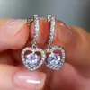 Deseo transfronterizo Europa y Estados Unidos Nuevo hebilla de oreja redonda con diamante de tres puntas hueco hebilla de oreja simple niche única venta al por mayor generación