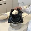 Bolso de mano acolchado con cadena de alta gama, versátil, moda 2026, transfronterizo, bolso pequeño tipo Chanel, de lujo ligero, para hombro y cruzado