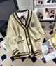 Suéter Jacket Estilo Universitario Cárdigan para Mujer Otoño e Invierno 2025 Nuevo Holgado Perezoso Británico de Longitud Media Tejido