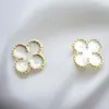 Pendientes Clásicos de Trébol de Cuatro Hojas, Elegantes y Sencillos, Pendientes Versátiles de Nicho, Lujo Ligero, Pendientes Retro de Alta Gama al por Mayor
