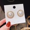 Pendientes minimalistas de verano de estilo coreano con aguja de plata 925, pendientes de perlas exageradas de celebridades de Internet de sentido avanzado, nuevos pendientes para mujer al por mayor