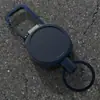 Chaveiro redondo metálico retrátil para exterior anti-perda anti-roubo fivela de oliva fivela de pendurar com cordão retrátil