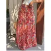 Saia longa estampada de cintura alta estilo resort transfronteiriça europeia e americana, saia estilo boho, nova de verão, solta, com barra larga