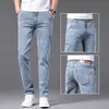 Jeans reto solto de luxo leve para homens, novo jeans de alta qualidade com stretch para primavera-verão 2026, jeans com orelha vermelha