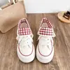 Zapatillas de lona de caña alta estilo coreano para mujer, nicho primavera estudiante chic, suela gruesa, doble uso, zapatos blancos, lindos y peculiares, zapatillas deportivas 2026