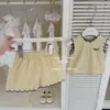 Pães de Creme LeEn para Bebês! Original 2026 Conjunto de Duas Peças Amarelo Estiloso com Renda para Meninas - Verão