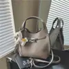 Bolsa Versátil Estilo Minimalista Bolsa Saco Feminina 2026 Nova Versátil para o Dia a Dia Moda Bolsa de Ombro Único Transversal