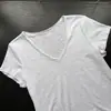 Nueva camiseta de verano versátil adelgazante de hilo de algodón y bambú, diseño holgado de hombros anchos con borde enrollado, cuello en V, manga corta 6303