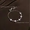 Pulseira de zircônia trevo feminina nicho ins luxo leve pulseira totalmente cravejada de diamantes popular online popular pulseira de temperamento requintado