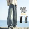 Vaqueros retro desgastados para hombre con vibra de calle americana, primavera y otoño, corte holgado, color liso, corte recto, ligeramente acampanado, adelgazantes, pantalones largos modernos
