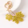 Llavero de Coche con Hoja de Arce y Perlas Incrustadas de Diamantes, Colgante de Metal para Bolso de Moda, Venta Caliente Creativa Transfronteriza, Regalo al por Mayor