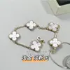 Pulsera de Piedra Burbuja Esmaltada de Trébol de Cuatro Hojas para Mujer, Versión de Alta Gama, Chapada en Oro V con Oro Rosa de 18 Quilates, Ágata Roja, Moderna
