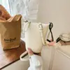 Bolsa Pequeña para Mujer de Marca Extranjera Súper Popular Modelo Nuevo 2026 Bolso para Teléfono de Nicho Bolso Cubo Bolso de Hombro Cruzado Versátil y Elegante
