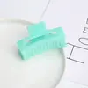 Moda coreana color caramelo hueco pinza para el pelo de mujer pinza para el pelo de coleta para el baño popular en línea hermosos accesorios para el pelo
