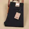 Calça masculina casual de moda reta fina respirável absorvente de suor elástica nova primavera e verão 24 anos