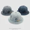 Estilo de mezclilla lavada para bebés y niños, nuevo y elegante sombrero de pescador lindo con orejas y cordón personalizado