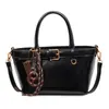Bolso de Mano de Alta Gama para Mujer 2026 Nuevo Otoño Estilo Motociclista Retro Bolso de Hombro para el Trabajo Bolso Cruzado Tipo Cubo