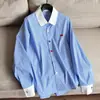 2026 Nueva Camisa de Rayas Color Block con Dobladillo Asimétrico, Camisa Cárdigan Estilo Boyfriend Top al por Mayor H12CT23302