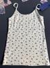 BM Wind Crescent Edge Rice Pit Strip Mulheres Bow Top Padrão Escuro Sling Floral