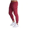 2023 Comércio Exterior masculino casual calças esportivas ao ar livre fitness running pants homens pés pequenos calças chanfradas fabricantes atacado