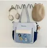 Nuevas mochilas para hombre y mujer para estudiantes de secundaria y preparatoria, gran capacidad, adecuadas para tutorías o como bolso de hombro, disponibles en dos estilos