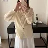 Toma real de ropa coreana de alta calidad de Dongdaemun para mujer, nuevas llegadas de verano, camisa elegante de estilo coreano simple para uso diario con lazo en la cintura, protección solar