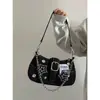Bolsa de axila em jeans com estrelas nova moda tendência design de nicho Bolsa crescente bolsa de mão em lona bolsa com corrente