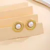 Pendientes de Perla con Textura de Lazo de Flor Europeos y Americanos Transfronterizos para Mujer Lujo Ligero Sentido de Alta Gama Moda Metálica Pendientes Distintivos