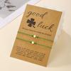 Pulsera de cuerda de mano con tarjeta de explosiones transfronterizas St. Pulsera tejida con colgante de trébol de la suerte verde Patrick, joyería al por mayor