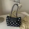 Bolso japonés textura simple bolso de hombro individual coreano gran capacidad 2026 nuevo otoño gamuza axila exquisito