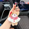 Gorro de cuadros capa oso de peluche llavero oso de peluche lindo capa oso de peluche rizado decoración de bolso femenina