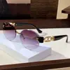 Nuevas Gafas de Sol de Moda Sin Marco Ovaladas con Borde Cortado Ins Personalizadas de Metal Hueco con Cierre Gafas de Sol para Protección Solar Callejera