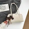 Bolso de axila retro de nicho para mujer, nueva colección otoño 2026, bolso de hombro de gran capacidad, bolso Boston tipo almohada para commuting