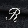 Temperamento de comercio exterior europeo y americano 26 broches de letras inglesas femenina diamante personalidad Joker moda corsage pin masculino accesorios